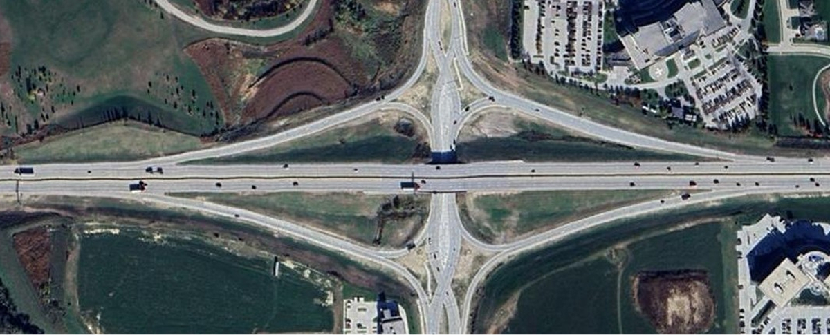 Aerial image titled “Where else do we see this?” showing a Diverging Diamond interchange at 192nd and West Dodge Road in Omaha. Source: WOWT News.